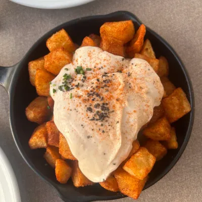 Patatas bravas en El Mirador de Can Cases