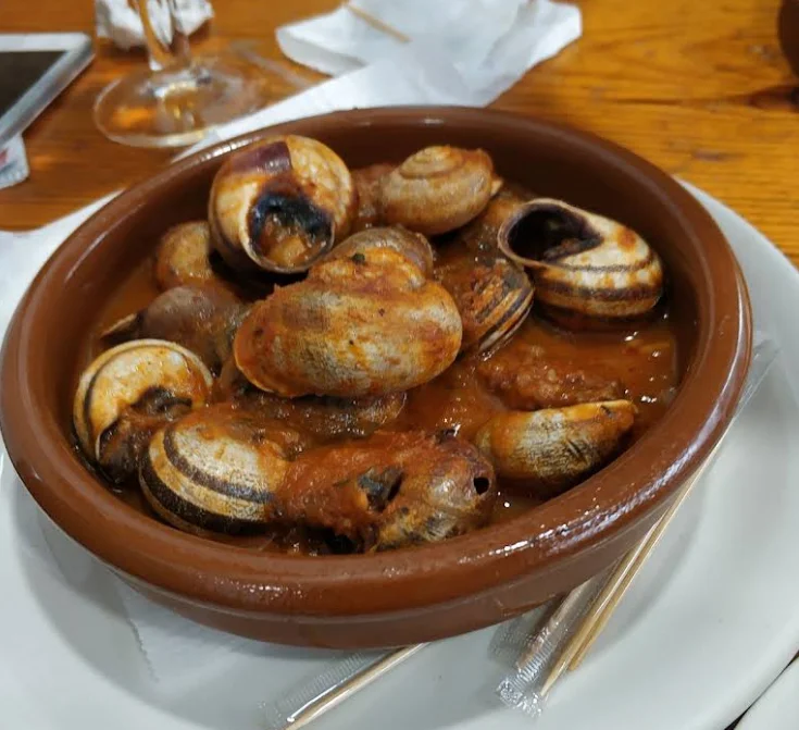 Caracoles con tomate