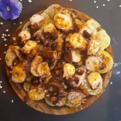Pulpo á feira en Restaurante El Bounty del Muelle