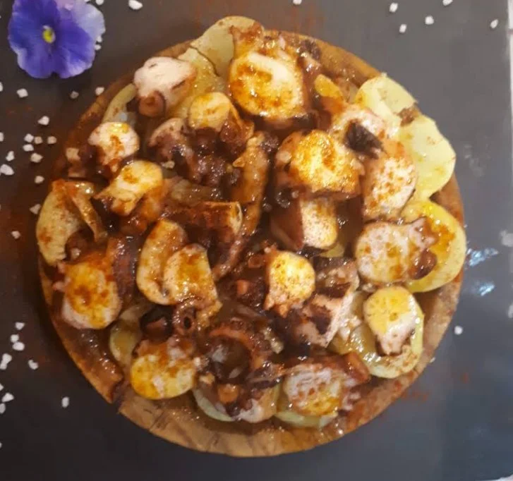 Pulpo á feira en Restaurante El Bounty del Muelle