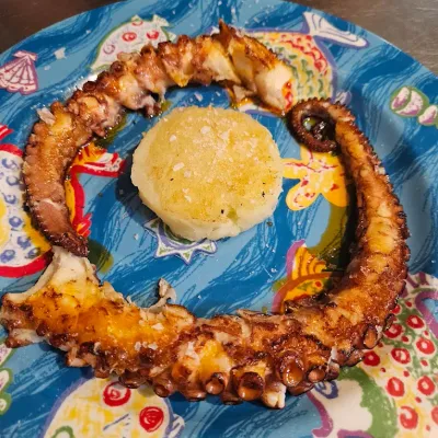 Pulpo a la brasa en Bar Coines